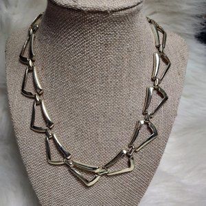 Gold colored necklace